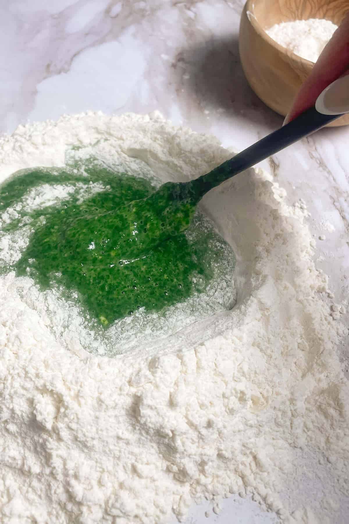 mixing pasta dough with a fork