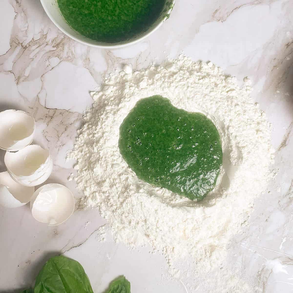 making green spinach pasta dough