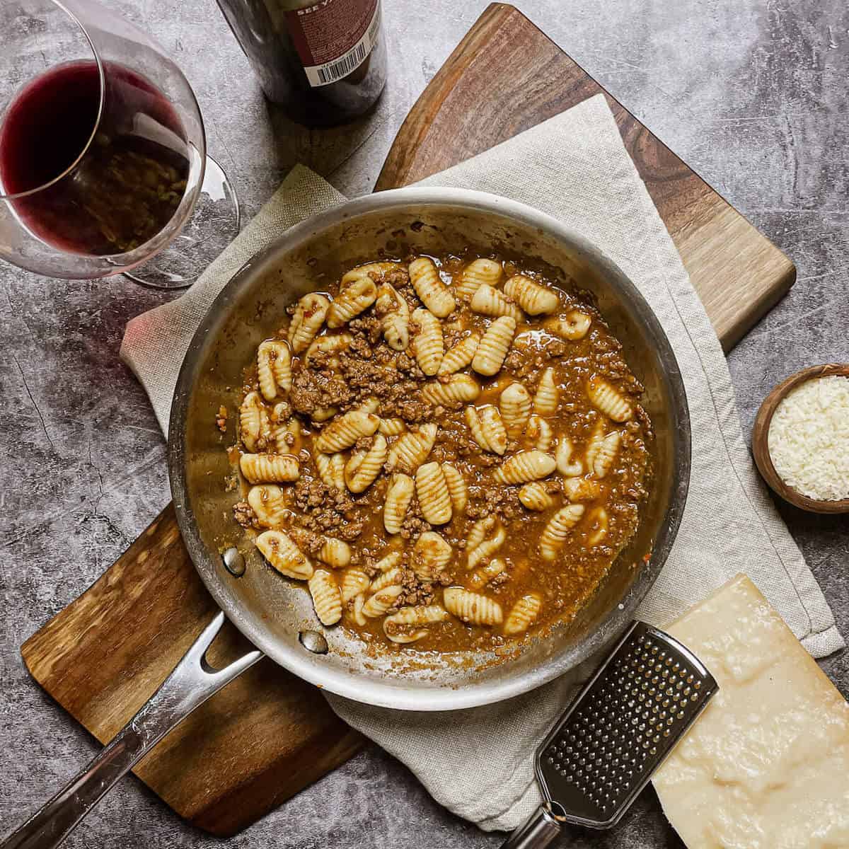 cavatelli in beef ragu in a pan