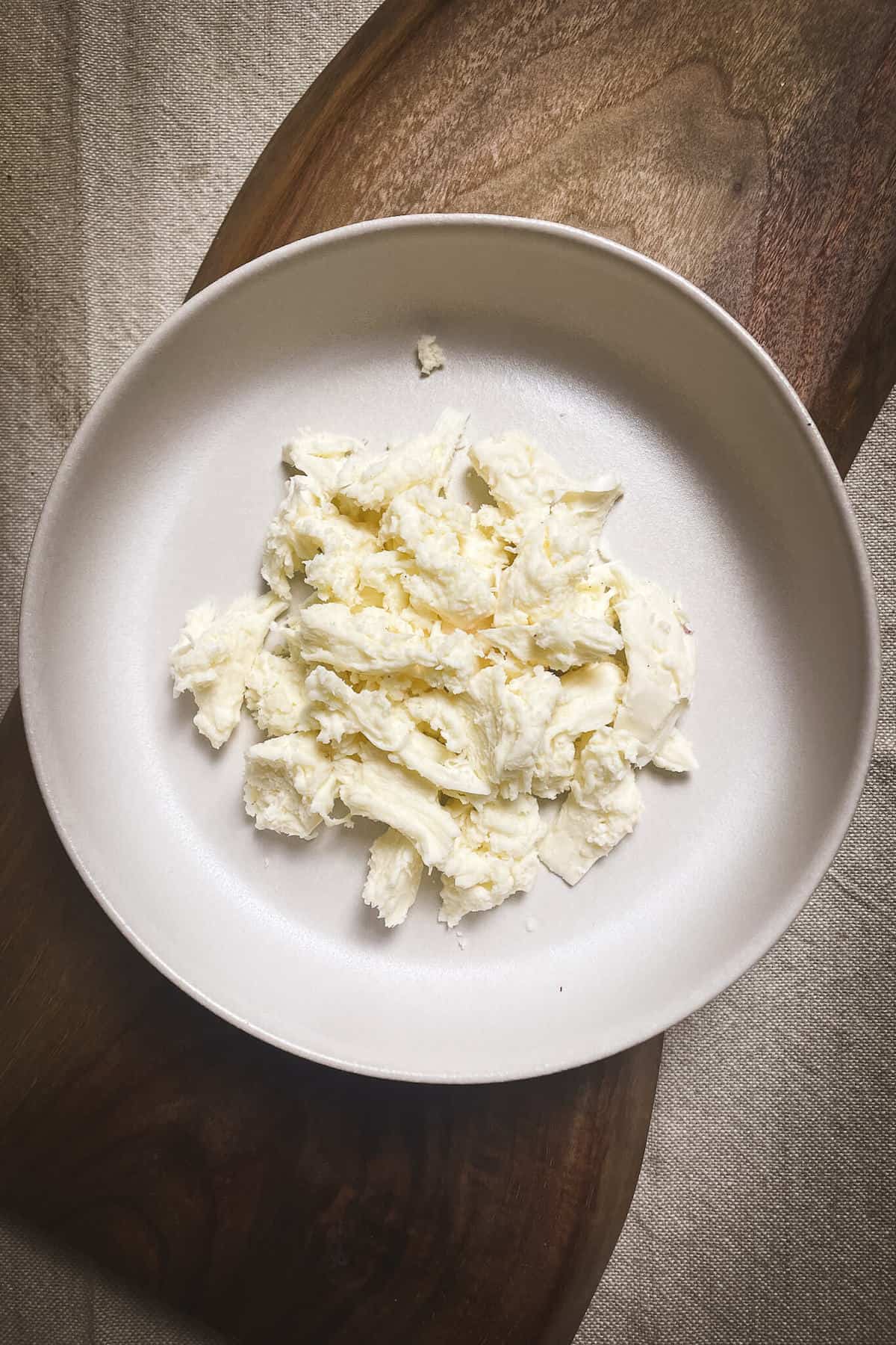 pieces of mozzarella cheese in a bowl
