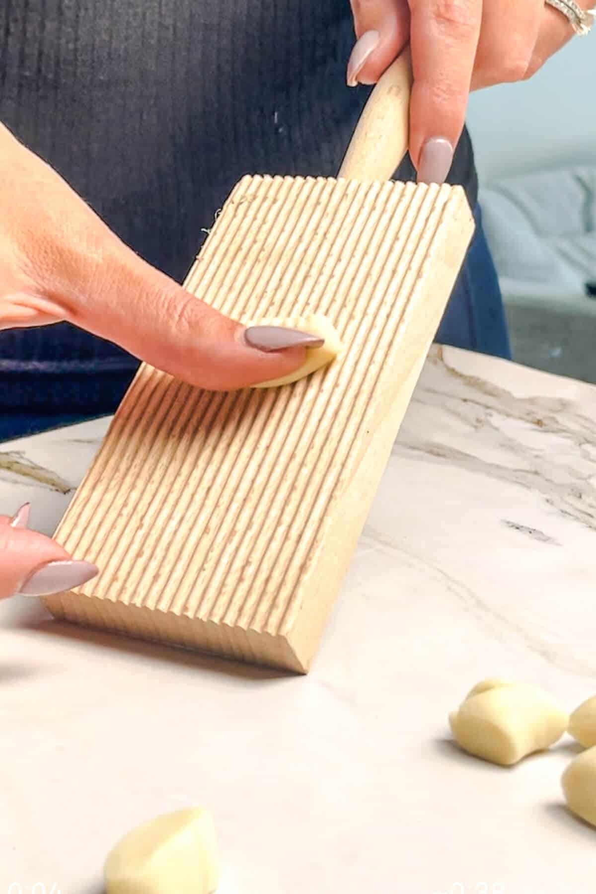 making gnocchi with a gnocchi board