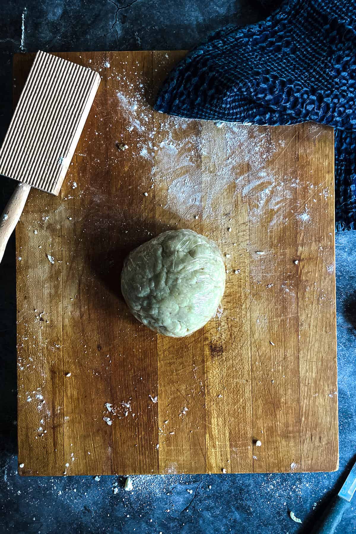 dough ball on a cutting board