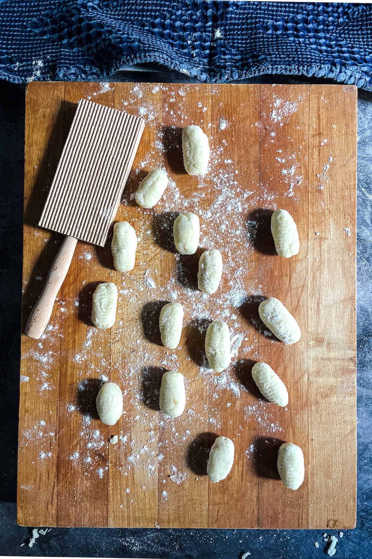 uncooked gnocchi on a cutting board