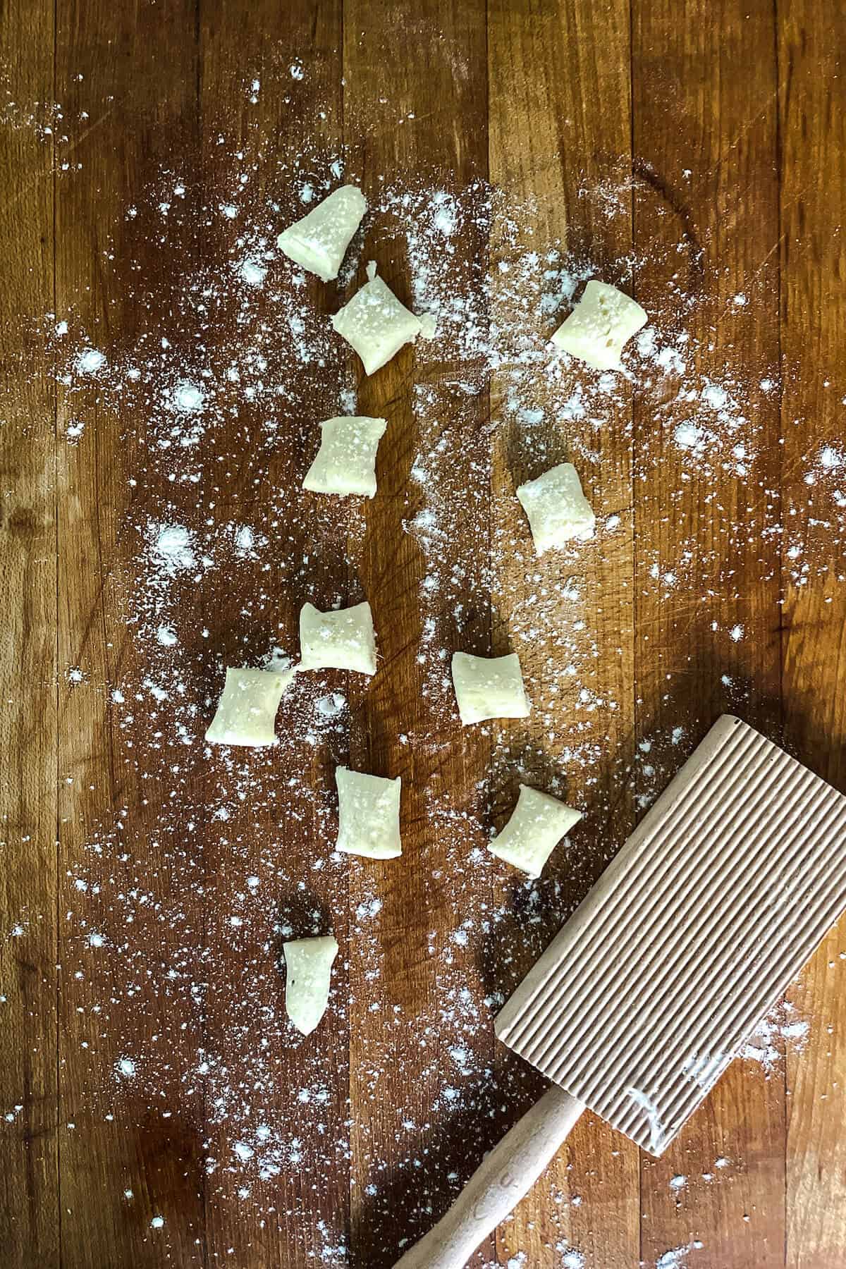 gnocchi pieces on a cutting board