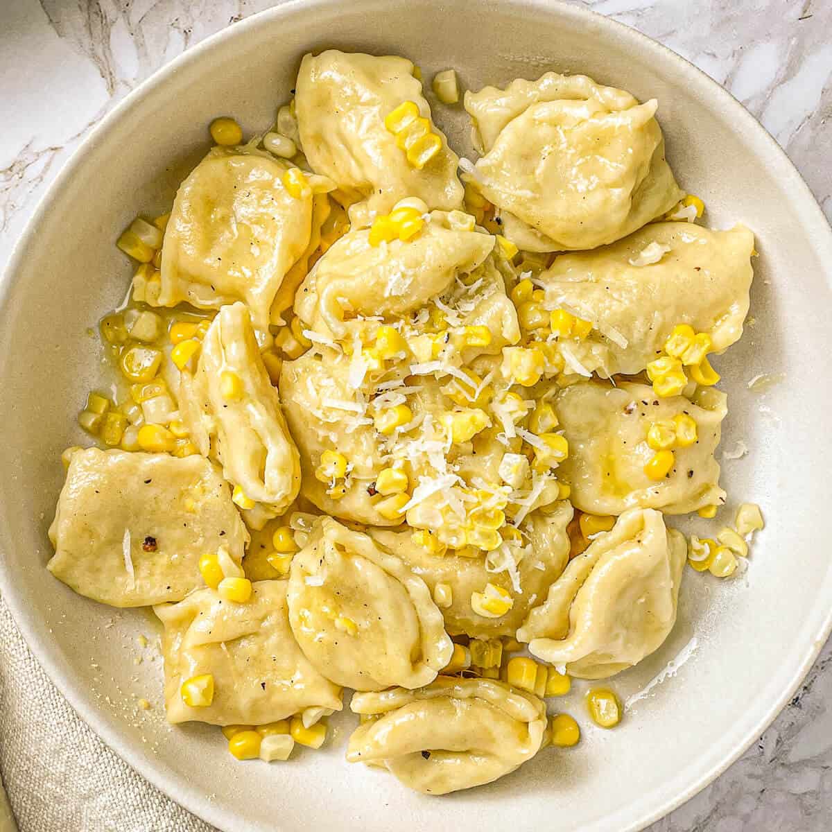 corn agnolotti in a bowl